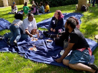 people eating at picnic